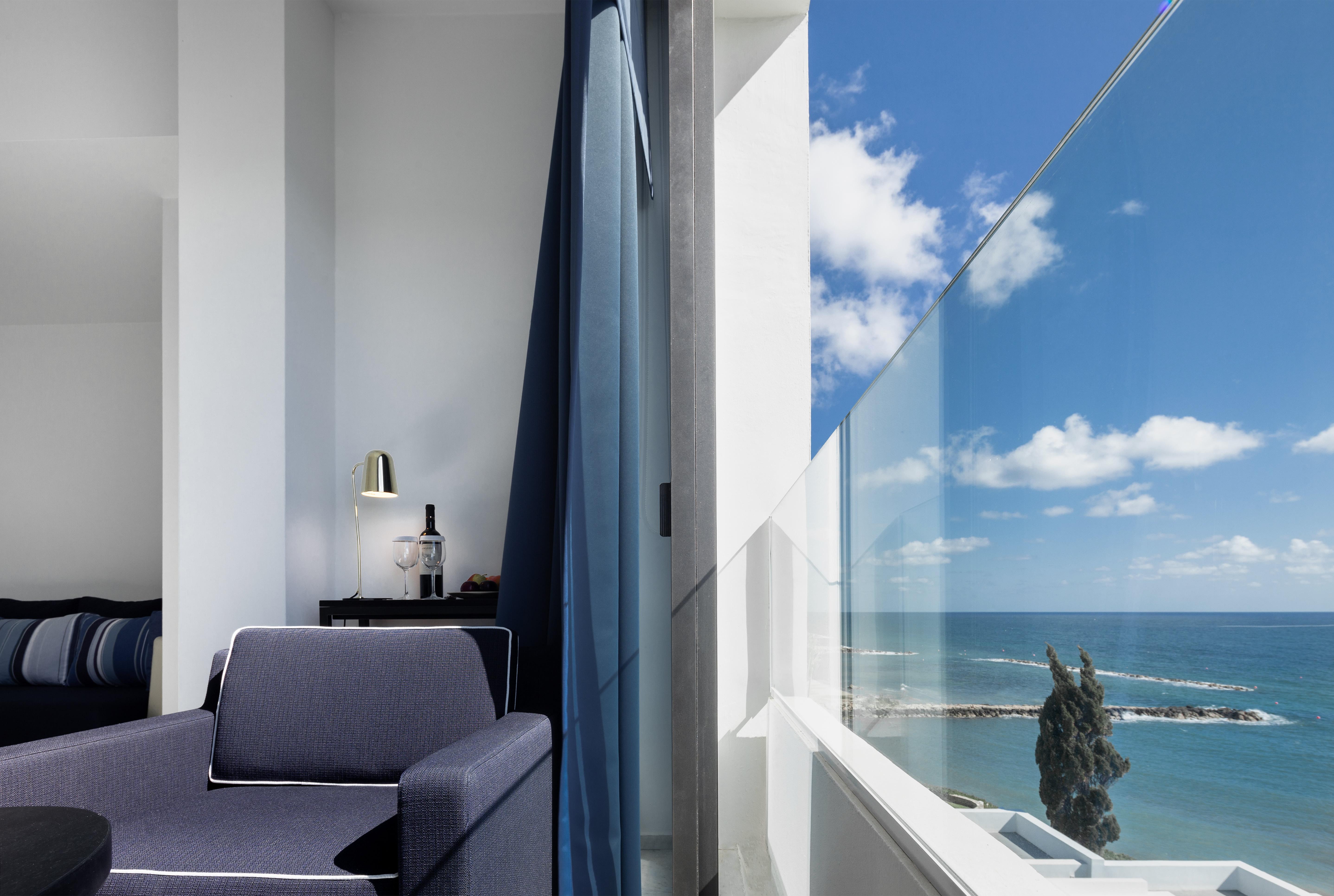 Almyra Hotel Paphos Luaran gambar Interior of a penthouse apartment