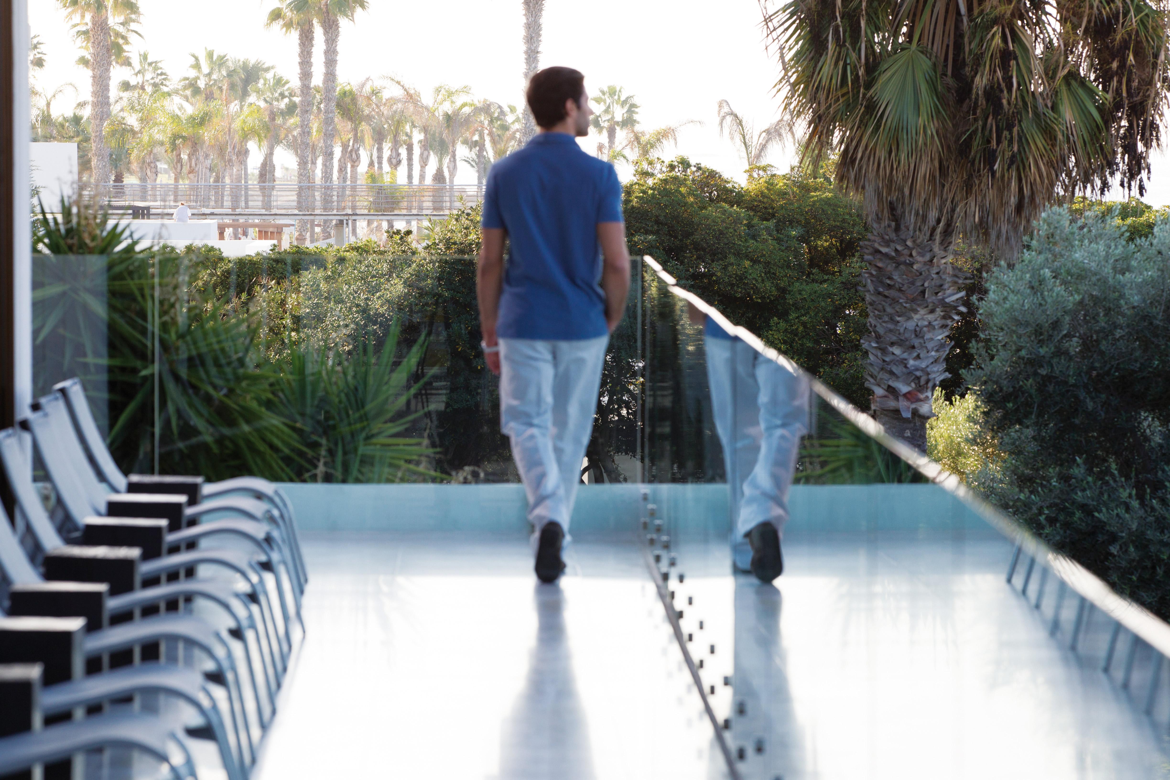 Almyra Hotel Paphos Luaran gambar A man walking
