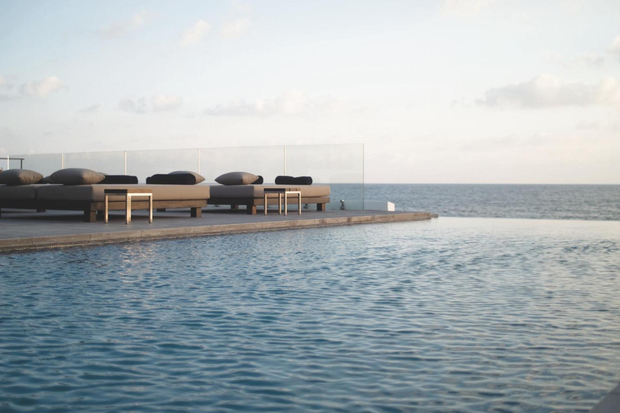 Almyra Hotel Paphos Luaran gambar The pool at the hotel