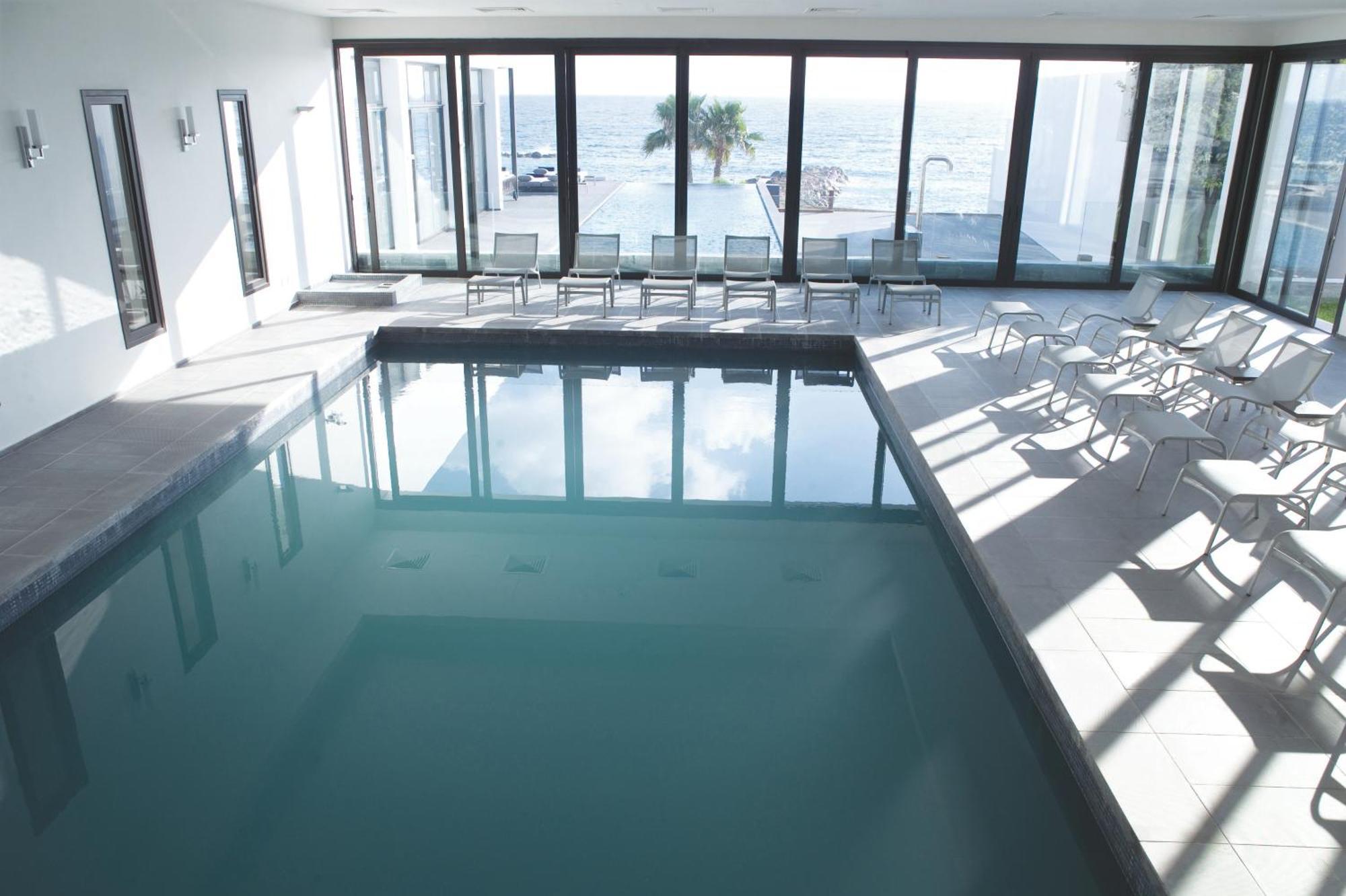 Almyra Hotel Paphos Luaran gambar The pool at the Hotel du Lac